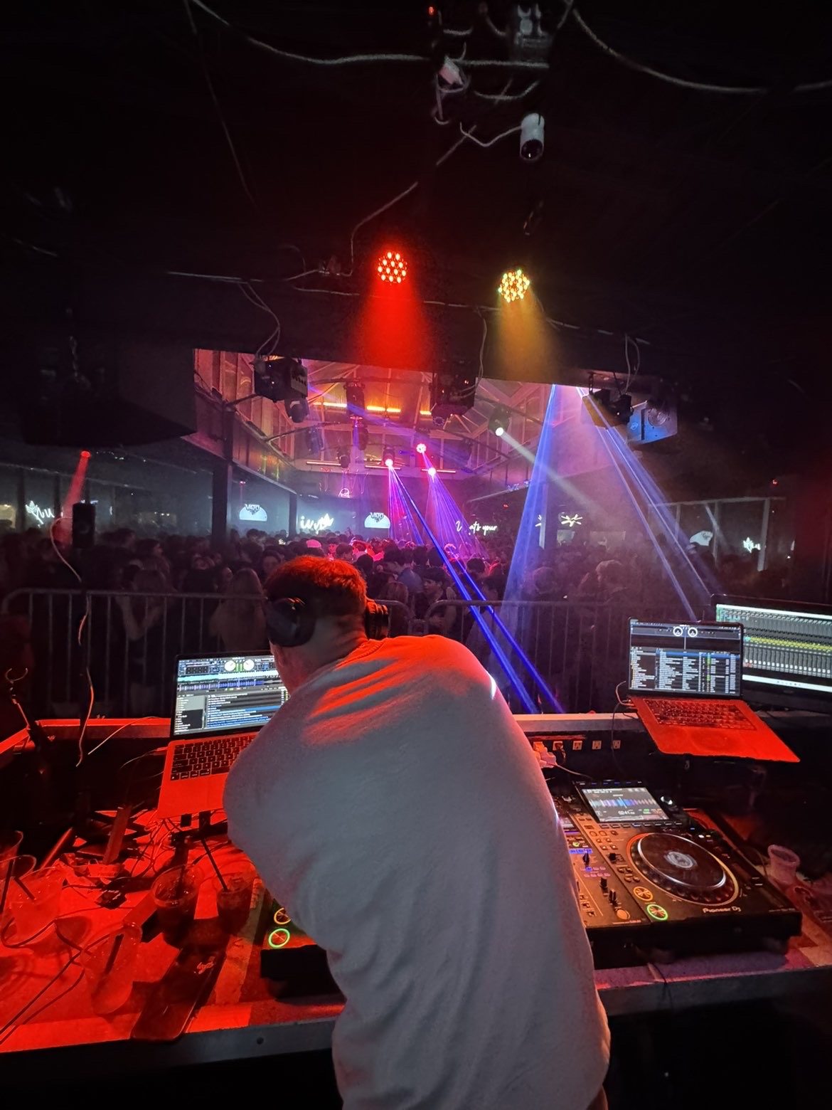VATO performing toward a packed nightclub room